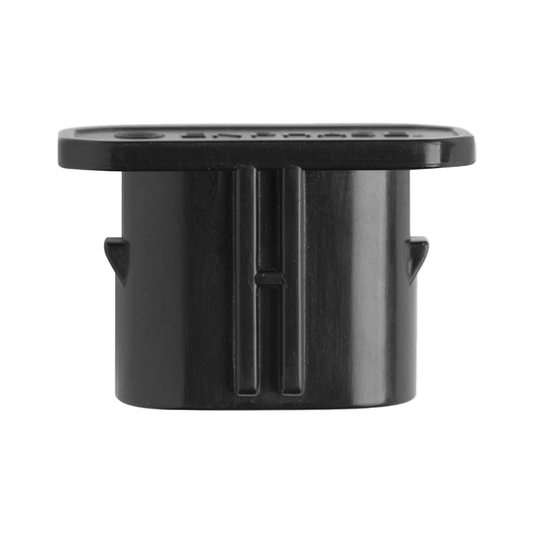 Black cylindrical object with a transparent top on a white background
