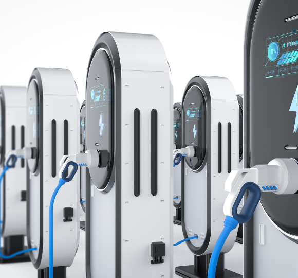 Row of electric vehicle charging stations with blue cables on a white background