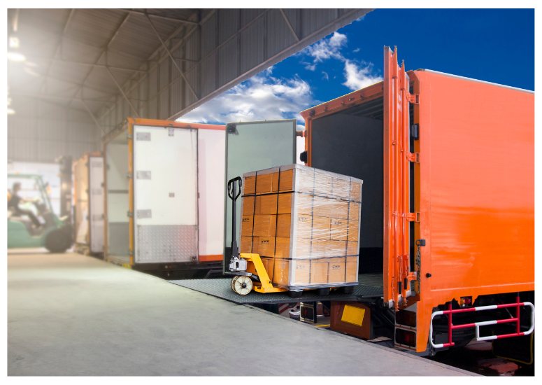 Container being loaded with boxes using a forklift in an industrial setting